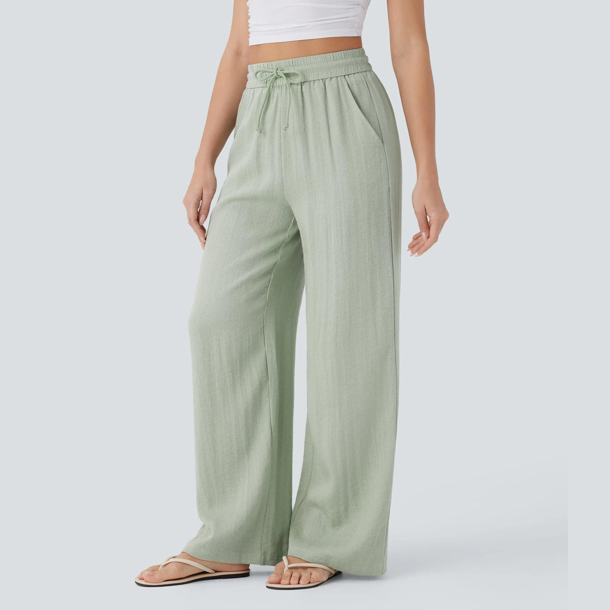 Pale Aqua high-waisted wide-leg pants, three-quarter view