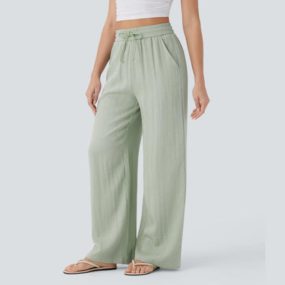 Pale Aqua high-waisted wide-leg pants, three-quarter view