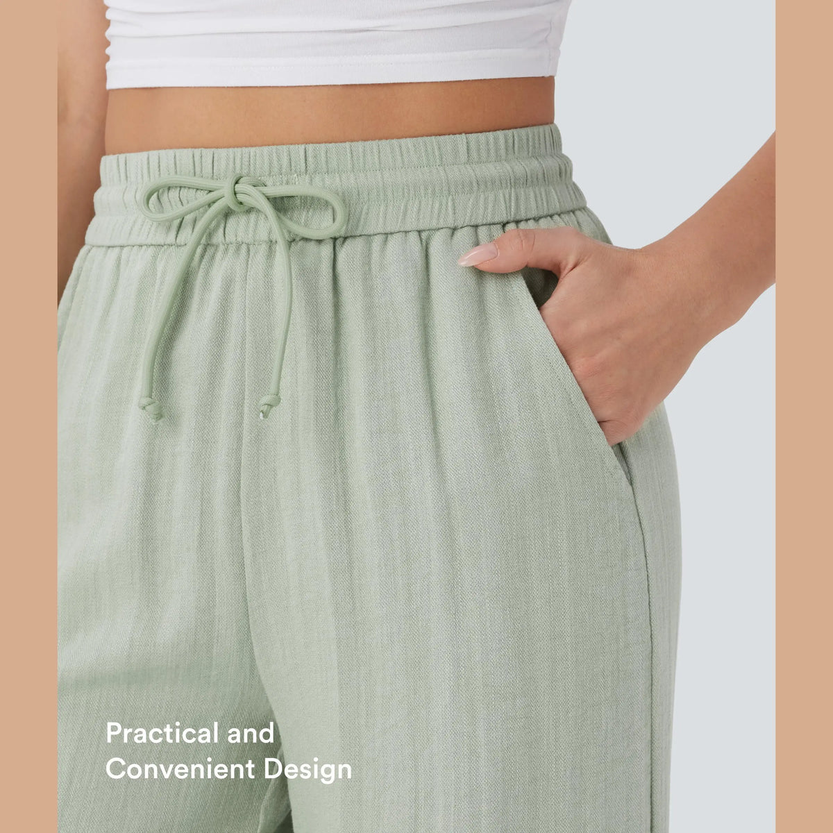 Side pocket and adjustable drawstring detail on Pale Aqua pants