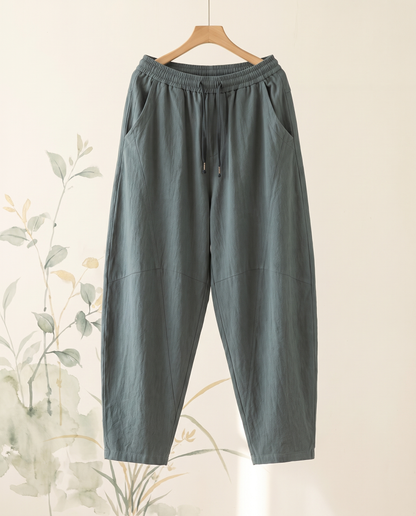 Men's Cotton Drawstring Pants with Pockets — hanging view