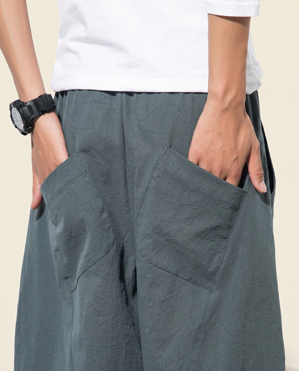 Men's Cotton Drawstring Pants with Pockets — pocket detail worn by a model
