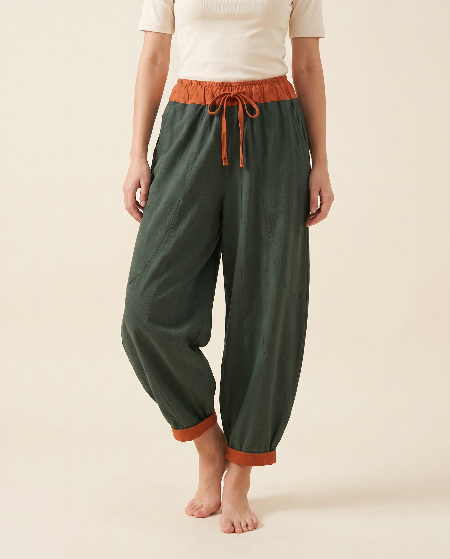 Cotton Drawstring Harem Pants with Pockets — worn by a model