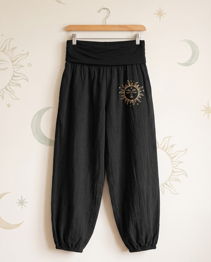 Sun & Moon Cotton Harem Pants — in black, hanging view