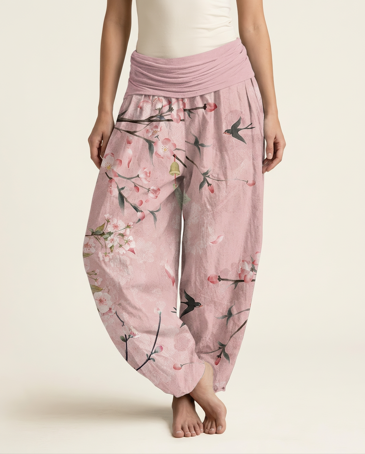 Peach Blossom Cotton Harem Pants — in pink, worn by a model