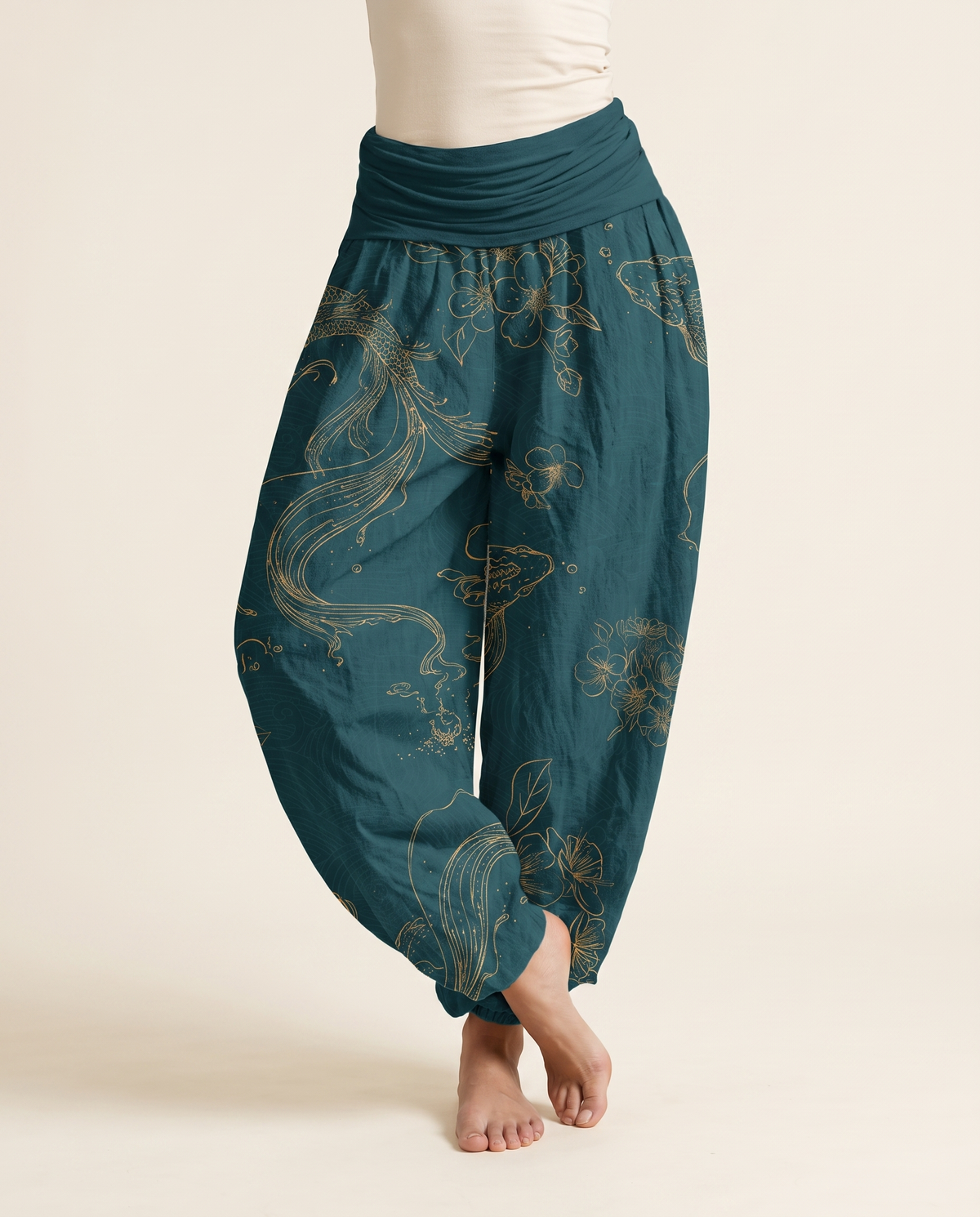 Koi Floral Cotton Harem Pants — in dark cyan, worn by a model