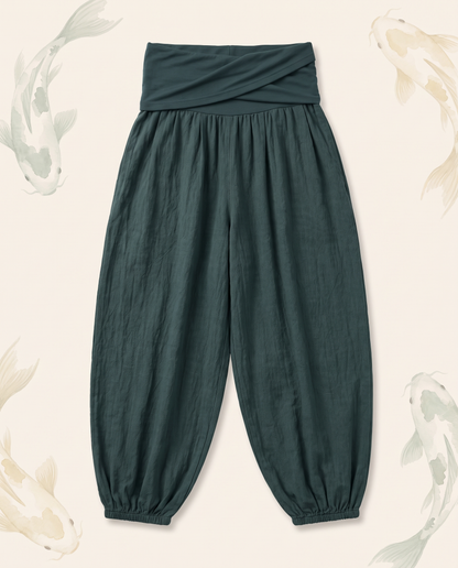 Koi Floral Cotton Harem Pants — in dark cyan, flat-lay view