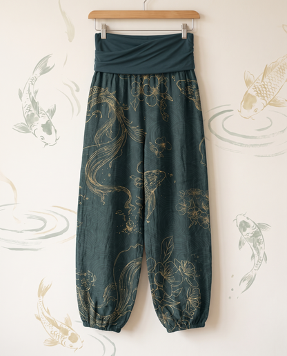 Koi Floral Cotton Harem Pants — in dark cyan, hanging view