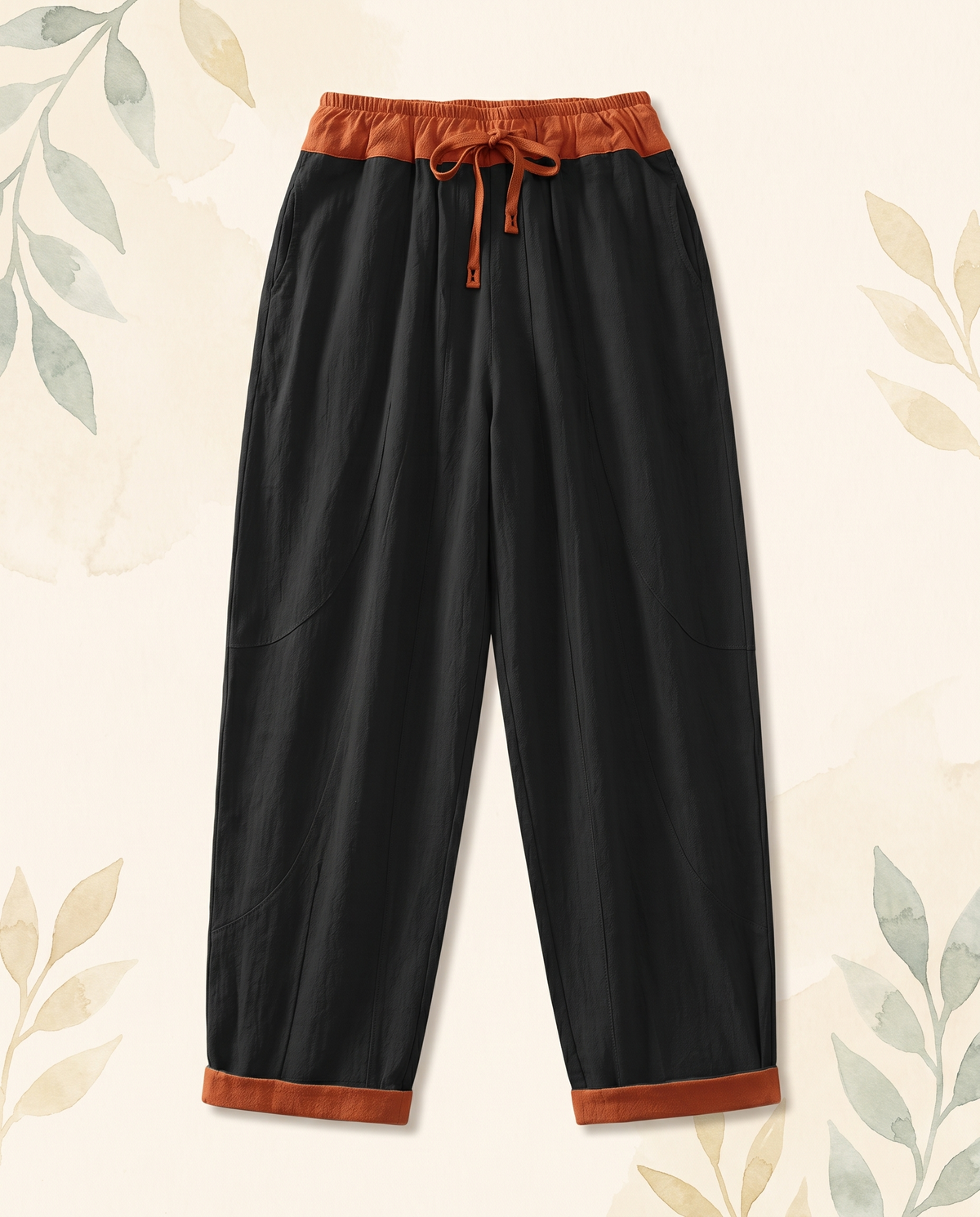 Cotton Drawstring Harem Pants with Pockets — in black, flat-lay view