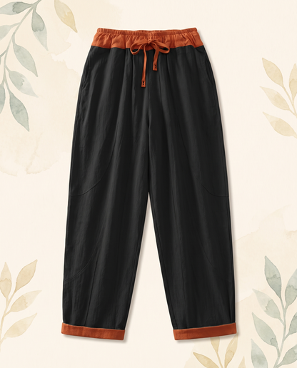 Cotton Drawstring Harem Pants with Pockets — in black, flat-lay view