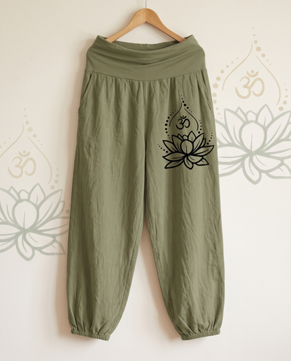 Lotus & Om Cotton Harem Pants — in olive drab, hanging view