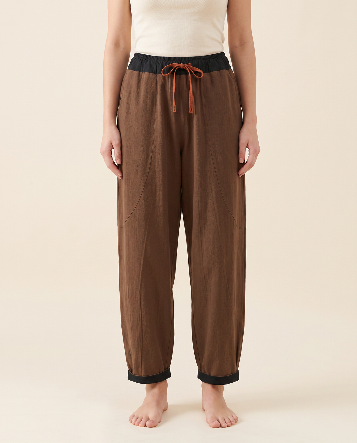 Cotton Drawstring Harem Pants with Pockets — in saddle brown, worn by a model