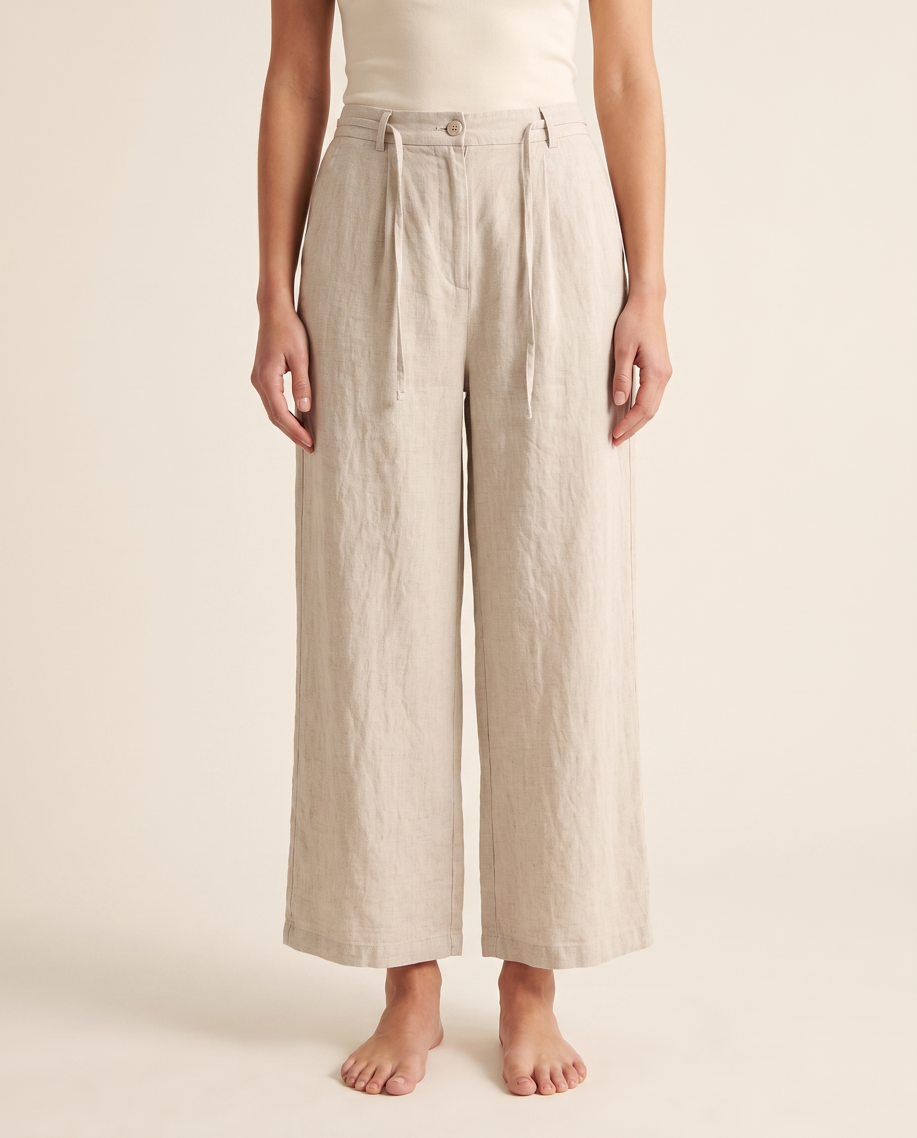 Cotton-Linen Ankle-Length Pants with Pockets — in linen, worn by a model