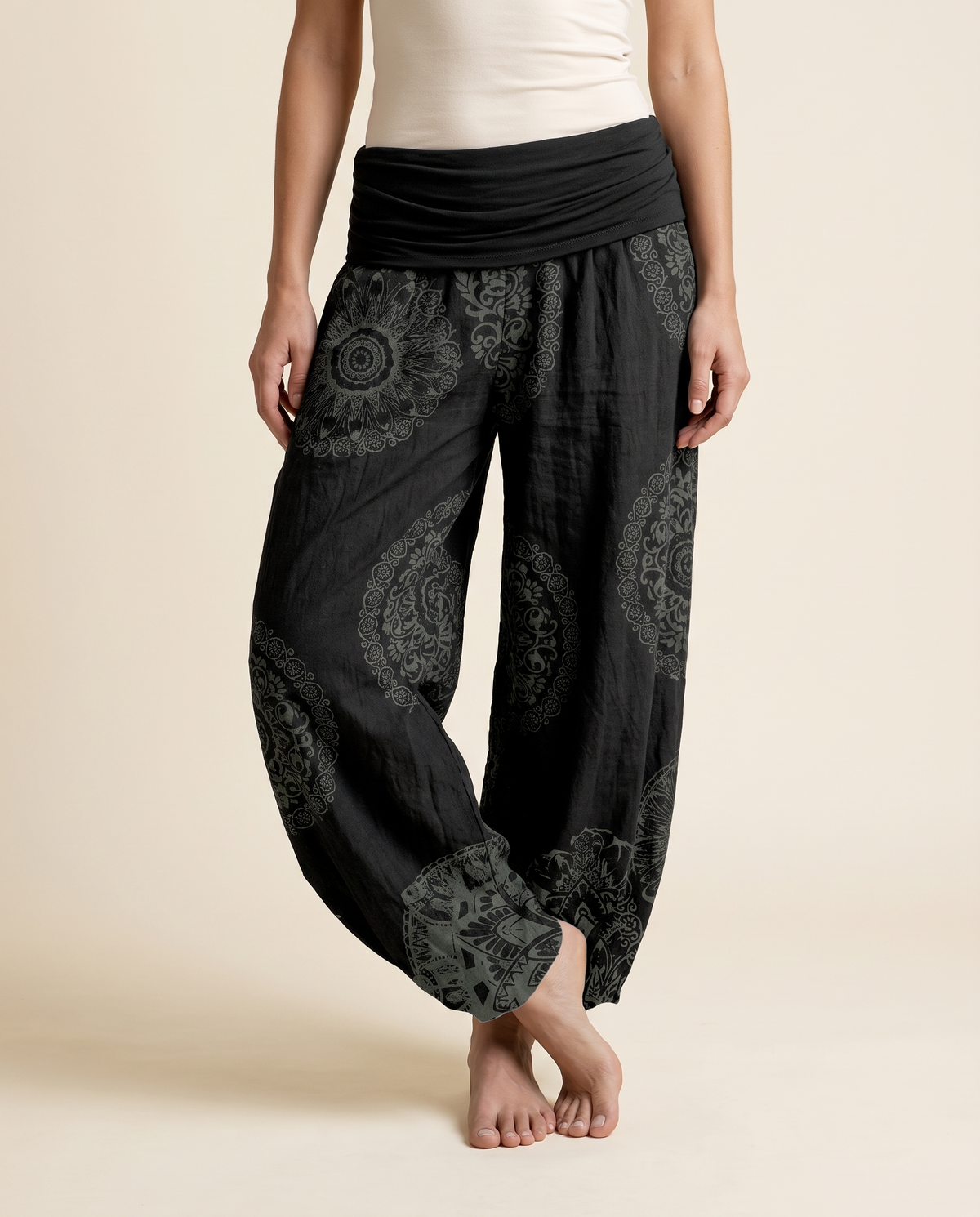 Mandala Cotton Harem Pants — in black, worn by a model