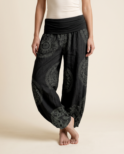 Mandala Cotton Harem Pants — in black, worn by a model