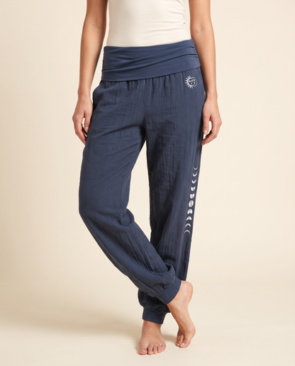 Sun & Moon Cotton Harem Pants — in dark slate blue, worn by a model