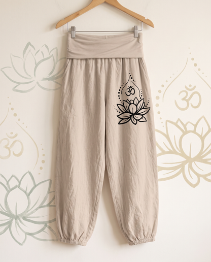 Lotus & Om Cotton Harem Pants — in tan, hanging view