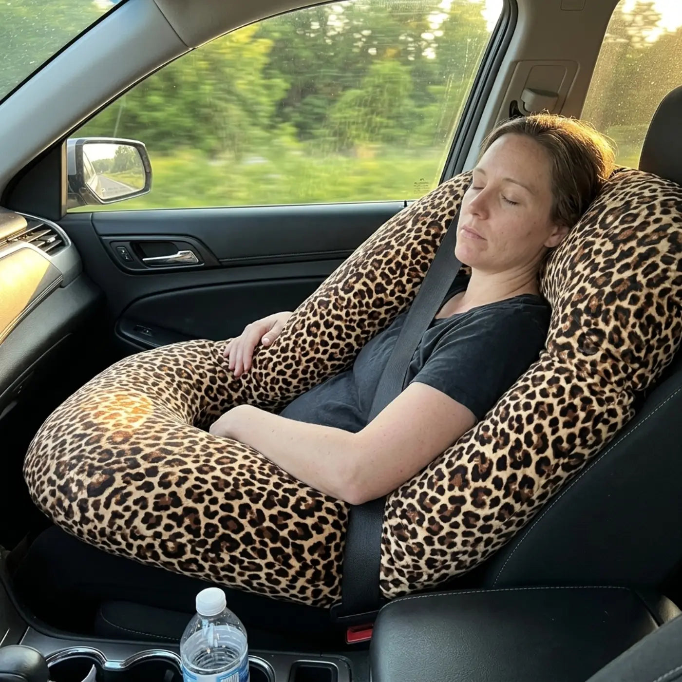 Napping on the J-Pillow in the car passenger seat